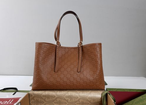 グッチ スーパーコピー 届く オフィディア GGエンボス トートバッグ ブラウン レザー調 モノグラムデザイン 815213